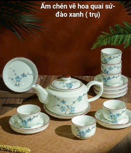 Bộ ấm chén vẽ hoa quai sứ - đào xanh trụ