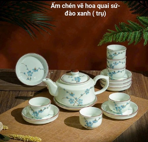 Bộ ấm chén vẽ hoa quai sứ - đào xanh trụ